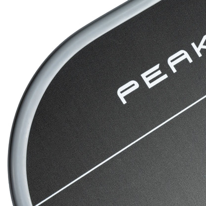 Close-up image of one of the best pickleball paddle for professionals with a white background. In the image you can appreciate the roughness of the surface, which makes it one of the best pickleball racket for spin.