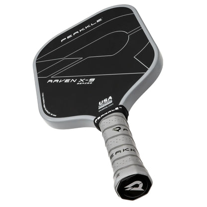 Image of one of the best usapa approved pickleball paddles being shown from a backward leaning perspective with a white background. Undoubtedly in the image you can appreciate one of the best quality pickleball paddles on the market.